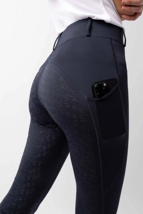 Breginsy jeździeckie Horze Dea w kolorze dark navy zaprezentowane przez modelkę, widoczne z tyłu