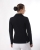 Frak jeździecki QHP JULIET w kolorze black zaprezentowany przez modelkę - widoczny z tyłu
