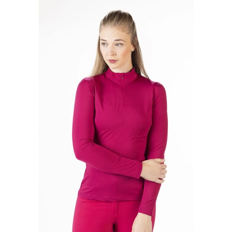 Bluzka jeździecka treningowa HKM Milano w kolorze fuksja zaprezentowana przez modelkę