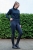 Legginsy do jazdy konnej HKM Flow Reflective w kolorze czarnym zaprezentowane przez modelkę