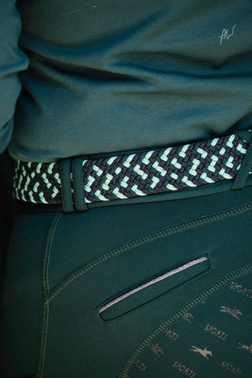 Breginsy zimowe z kieszeniami Schockemohle Termo Tights w kolorze bottle green widoczne z przodu
