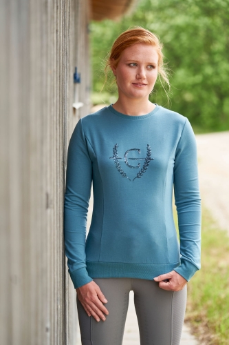 Bluza jeździecka damska Covalliero w kolorze navy zaprezentowana przez modelkę
