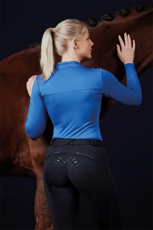 Breginsy zimowe Schockemohle Termo Tights w kolorze deep night zaprezentowane przez modelkę, widoczne z tyłu