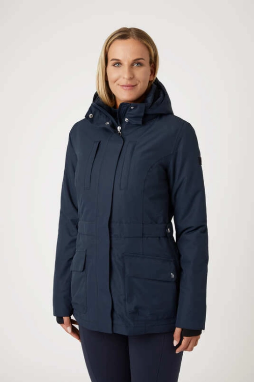 Ciepła kurtka jeździecka Horze Jadine w kolorze navy zaprezentowana przez modelkę