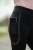 Breginsy dziecięce z kieszenią na telefon w kolorze czarnym HKM Junior Polly zaprezentowane przez modelkę