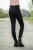 Breginsy dziecięce z elastyczną nogawką w kolorze czarnym HKM Junior Polly zaprezentowane przez modelkę, widoczne z tyłu