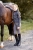 Koszulka jeździecka dziecięca termiczna Horze Pegasus w kolorze caviar black zaprezentowana przez modelkę