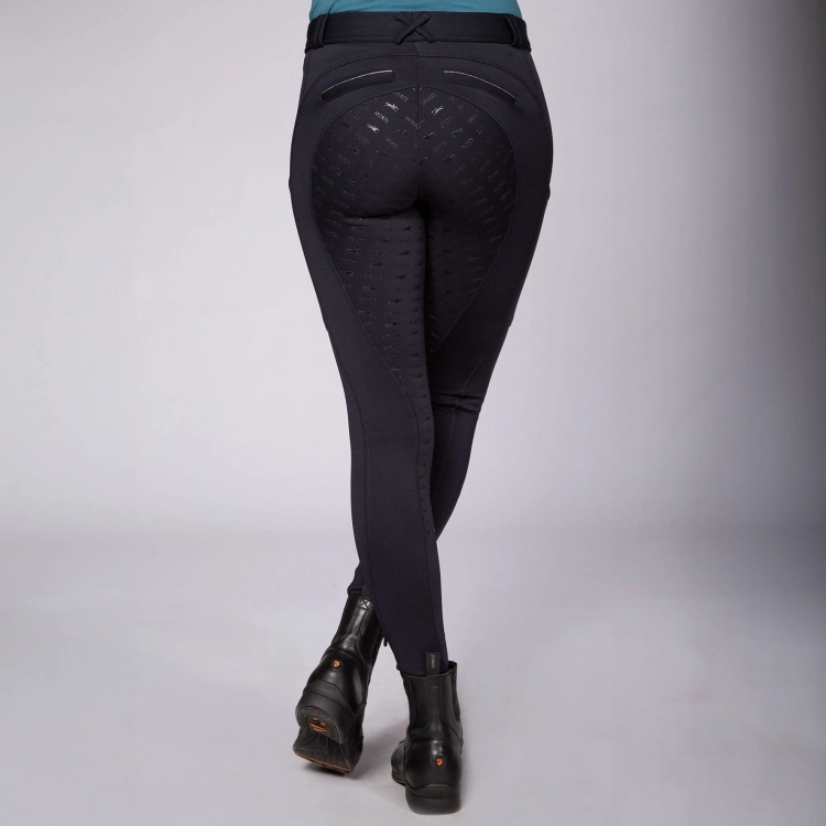 Breginsy zimowe Schockemohle Termo Tights w kolorze deep night zaprezentowane przez modelkę, widoczne z tyłu