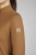Koszulka jeździecka zimowa Eskadron Half-Zip w kolorze almond zaprezentowana przez modelkę