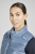 Kamizelka jeździecka Eskadron Classic Sports Quilt w kolorze steel blue zaprezentowana przez modelkę