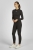 Legginsy do jazdy konnej Eskadron Dynamic Cosy w kolorze czarnym zaprezentowane przez modelkę