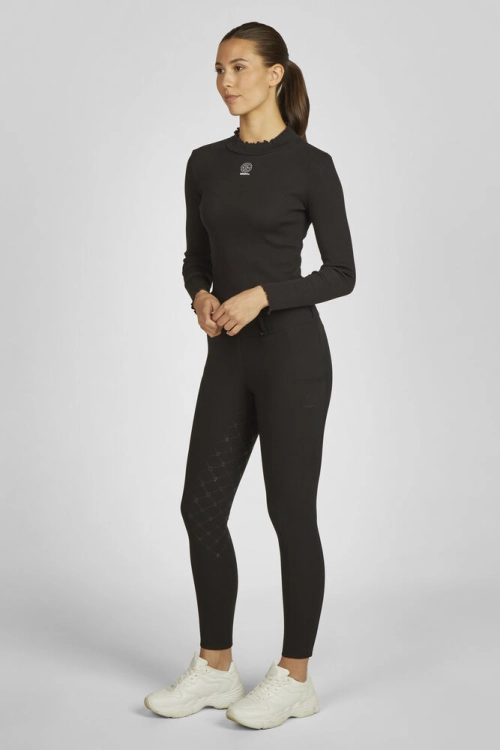 Legginsy do jazdy konnej Eskadron Dynamic Cosy w kolorze czarnym zaprezentowane przez modelkę