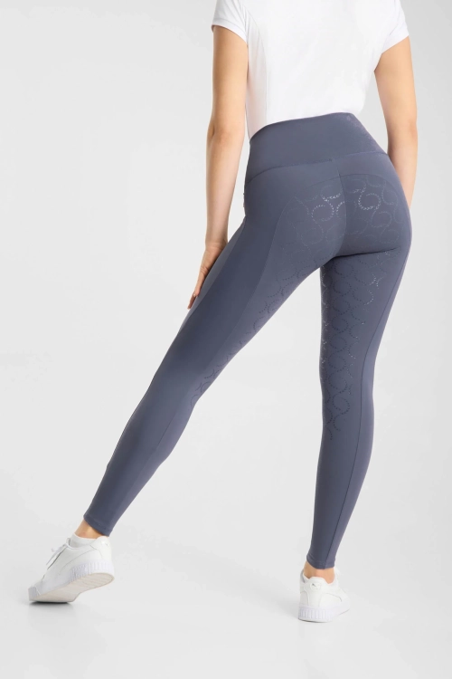 Legginsy do jazdy konnej kompresyjne Horze Gillian w kolorze szarym zaprezentowane przez modelkę