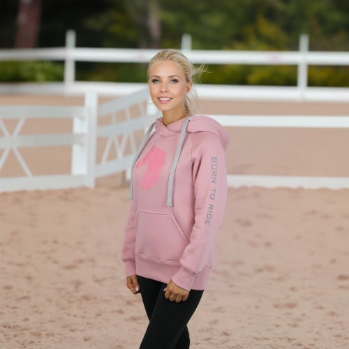 Bluza jeździecka damska Horsenjoy Born To Ride w kolorze różowym zaprezentowana przez modelkę