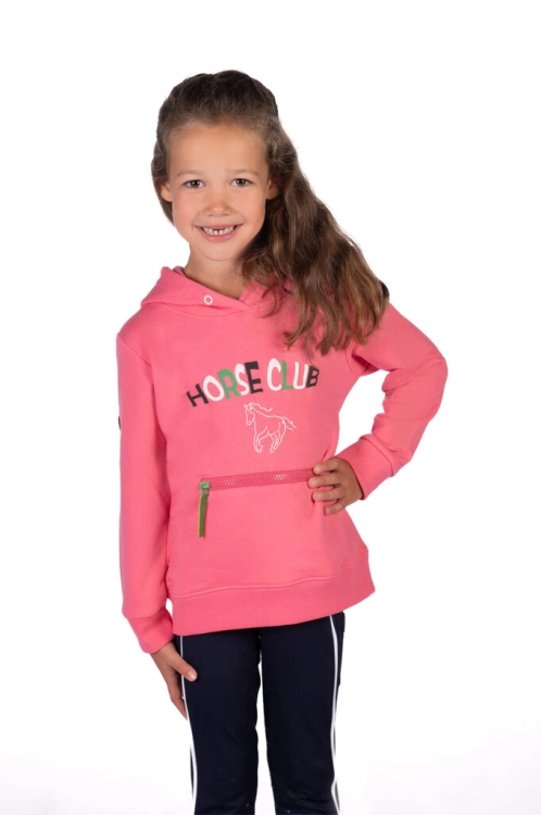 Bluza jeździecka dziecięca HKM Junior Maui w kolorze różowym zaprezentowana przez modelkę